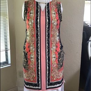 Lightweight stretch knit sleeveless dress.